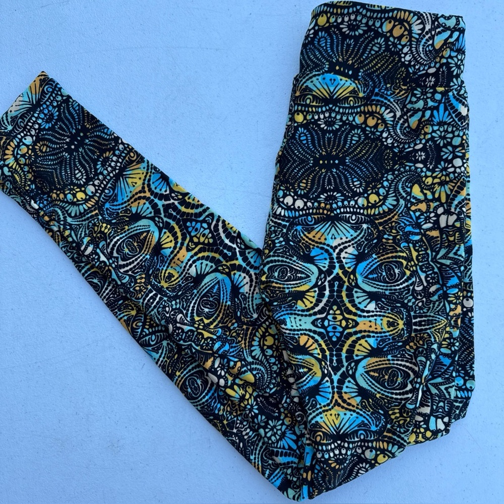 NWOT LuLaRoe OS One Size Women's Leggings - Black, Blue, and Yellow Pattern